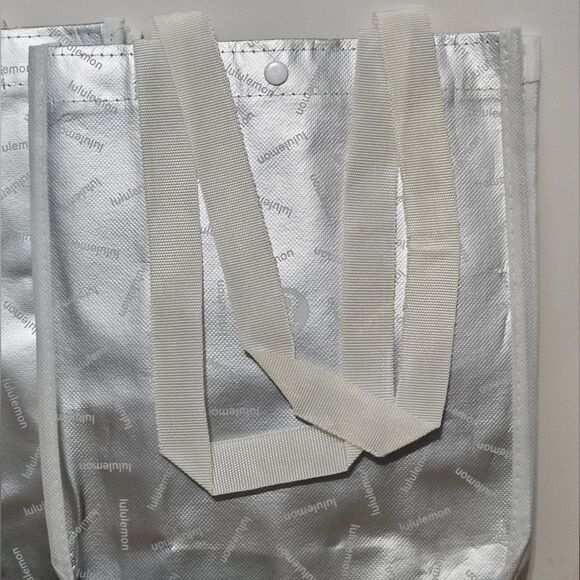 Lululemon, Set of 2 Small silver Shopping Bags & 1 Vapor & Gold Keychain. NWT - Picture 2 of 4